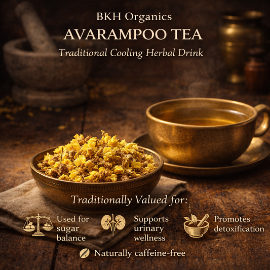 BKH Organics Avaram poo Tea with a gold cup and herbs on a wooden surface, BKH Organics Avarampoo Dry Flowers (தமிழ்: ஆவாரம்பூ உலர்ந்த பூக்கள், తెలుగు: ఎండిన తంగేడు పూలు, ಕನ್ನಡ: ಒಣಗಿದ ಆವರಿಕೆ ಹೂವುಗಳು, മലയാളം: ഉണങ്ങിയ ആവാരംപൂവ്, ತುಳು: ಒಣಗಾದಿನ ಆವಾರಂಪೂ) herbal tea pouch with steaming cup and traditional brass filter against a sunrise backdrop