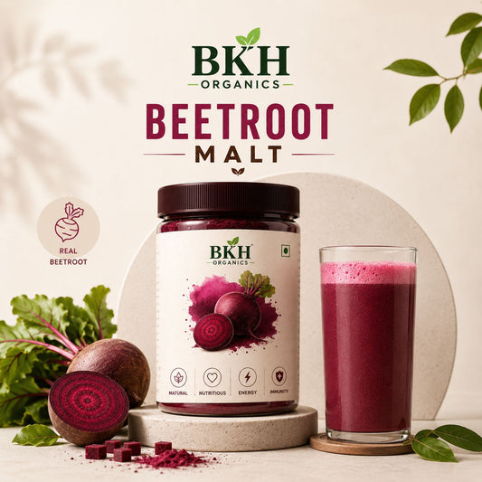 BKH Organics Beetroot Malt with a glass of beetroot juice and fresh beets on a light background