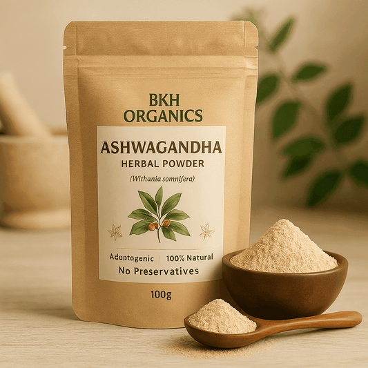 BKH Organics Ashwagandha herbal powder packaging with a bowl and spoon of powder on a wooden surface. Aswagandha Herbal Powder 100g - BKH Organics