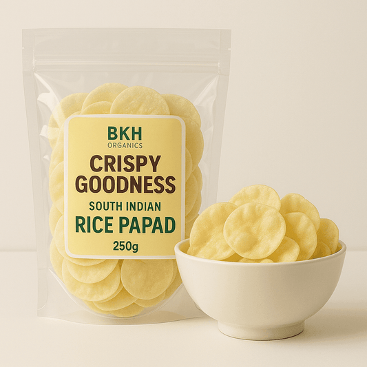 Packaged South Indian rice papad with a bowl of papad on a light background, Arisi Vathal 250g - BKH Organics