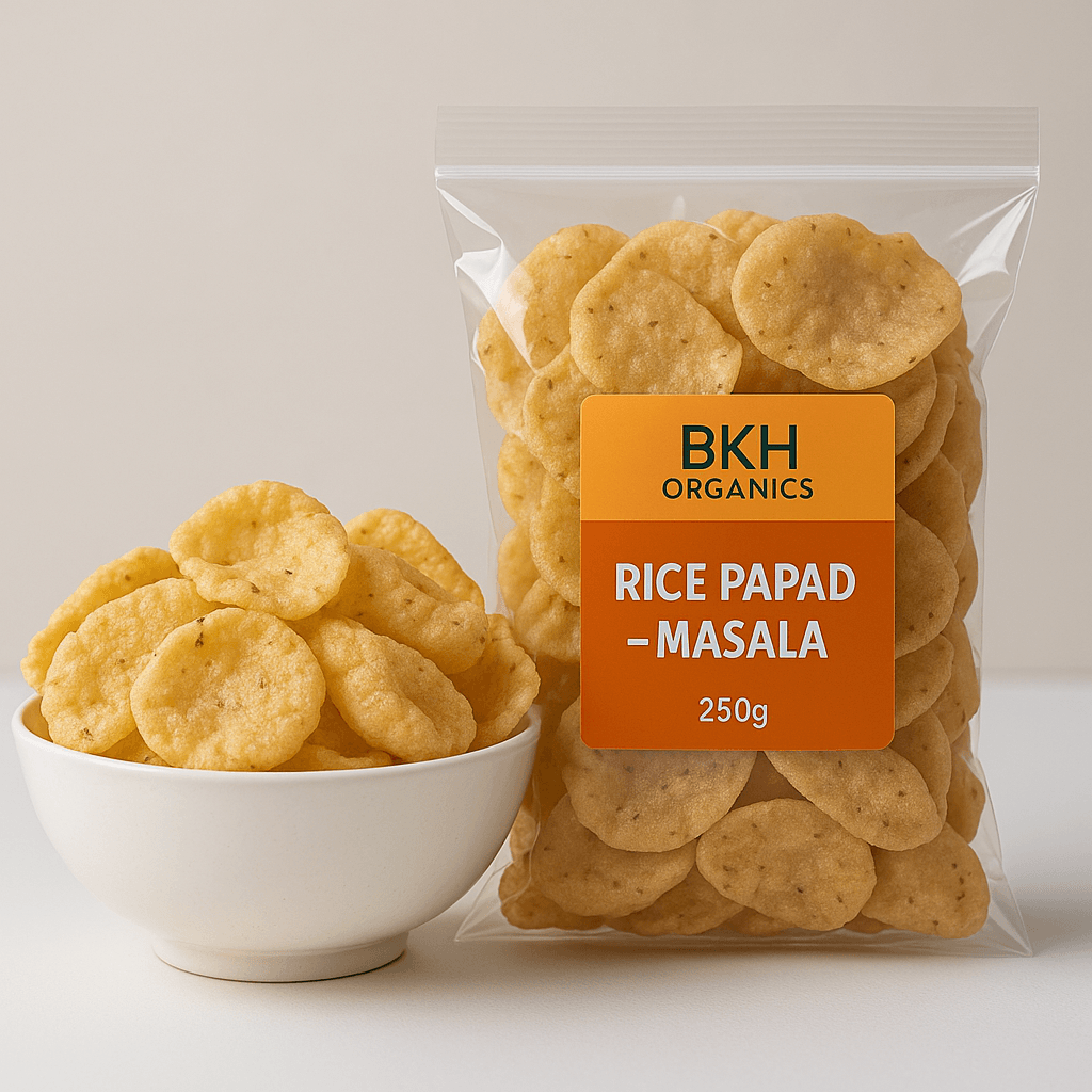 Packaged rice papad with a bowl of rice papad on a light background