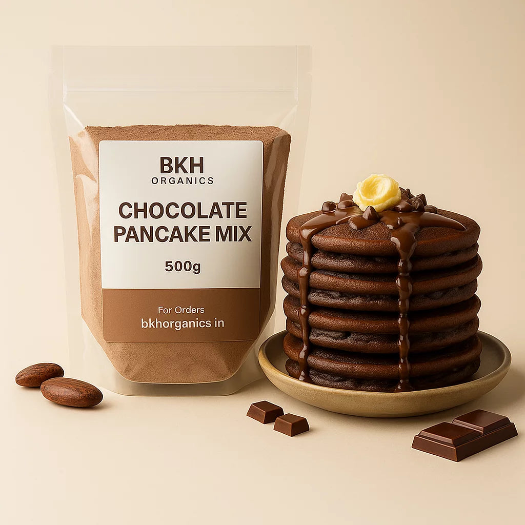 BKH Organics chocolate pancake mix package with a stack of chocolate pancakes on a beige background