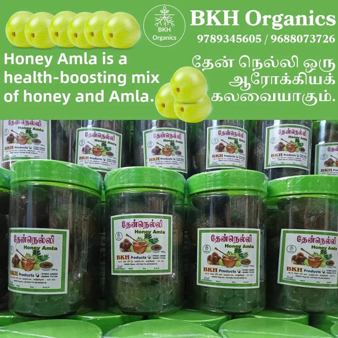 Jars of BKH Organics Honey Amla with green lids on a green background