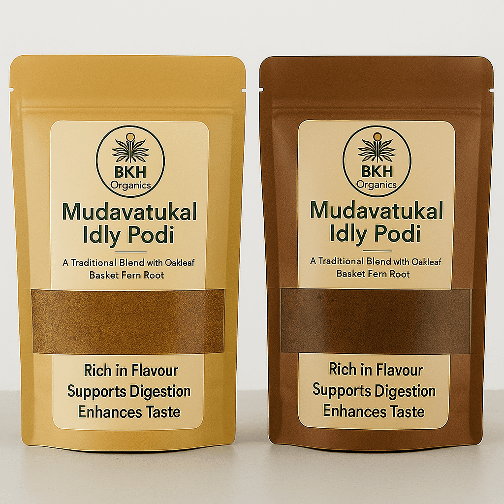 Two packages of BKH Organics Mudavatukal Idly Podi on a white background - Close-up of Oakleaf Basket Fern Root, - Mudavatukal Kizhangu