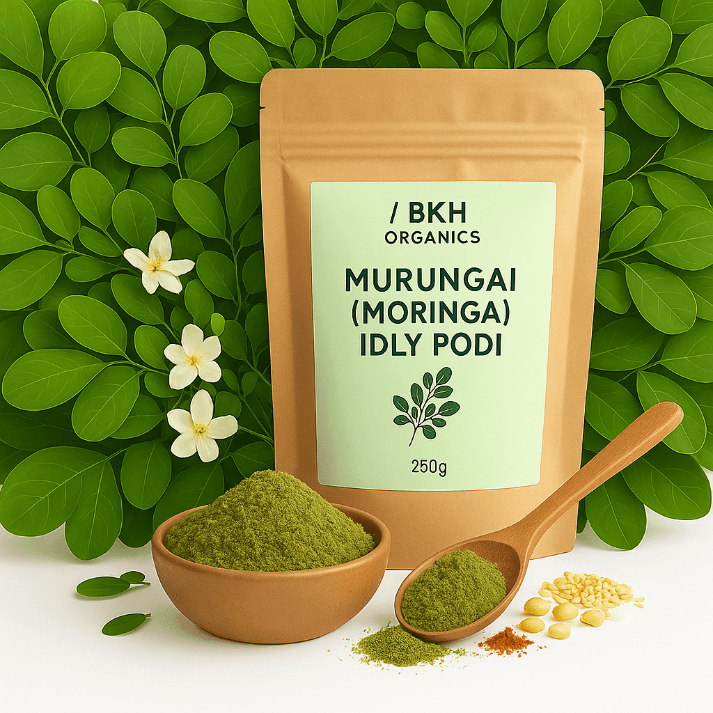 BKH Organics Murungai Moringa Idly Podi packaging with green leaves and flowers in the background. Murungai idly & Dosa Podi 250g - BKH Organics