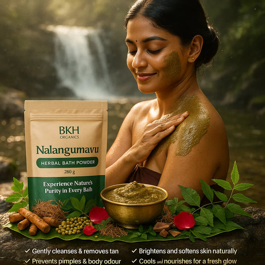 Woman applying herbal bath powder to her skin with a natural setting and BKH Organics Nalangumavu product in the foreground.