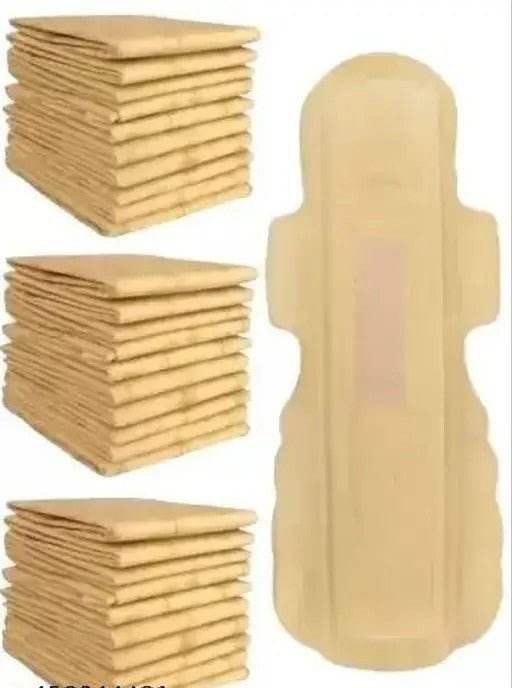 Stacks of beige cloth diapers and a single diaper on a white background. Bamboo Sanitary Napkins 14pc - BKH Organics