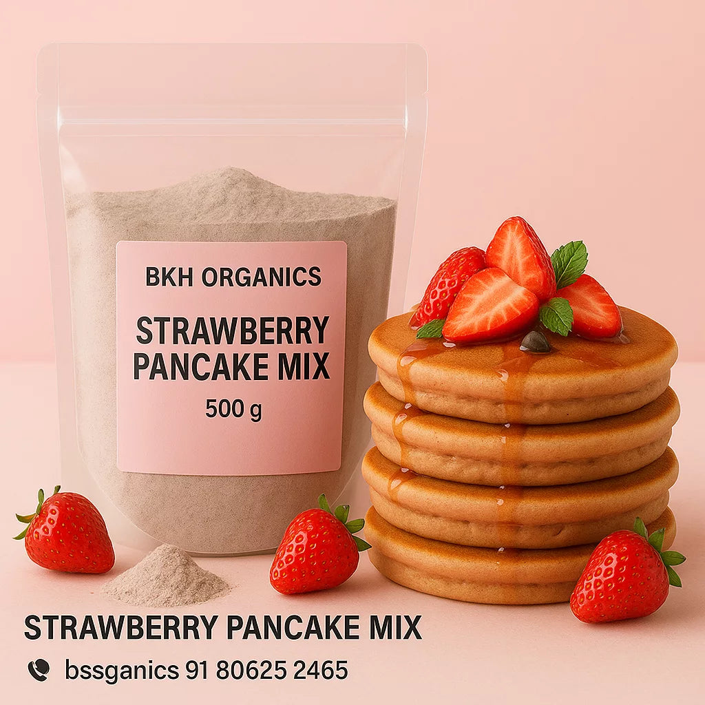 BKH Organics Strawberry Pancake Mix with a stack of pancakes and strawberries on a pink background