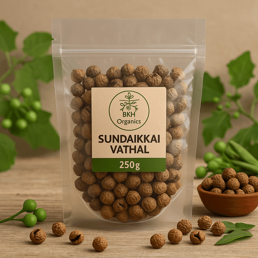 Packaged Sundalkkai Vathal with BKH Organics label on a wooden surface with green leaves in the background