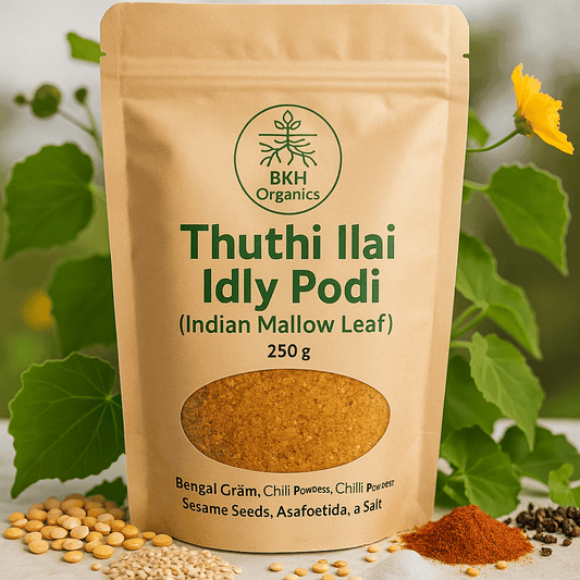 BKH Organics Thuthi Ilai Idly Podi packaging with ingredients displayed on a natural background