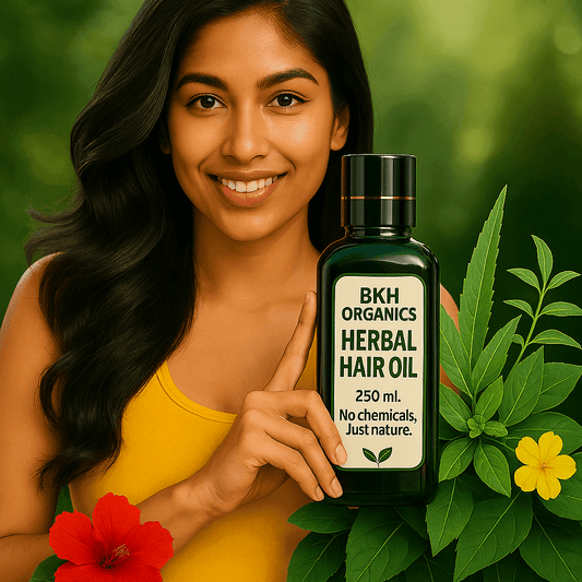 Woman holding a bottle of BKH Organics Herbal Hair Oil with greenery and flowers in the background