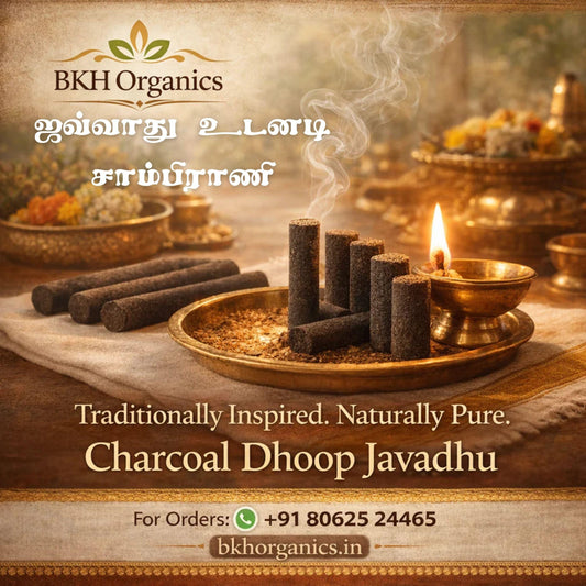 BKH Organics Charcoal Dhoop Javadhu with incense sticks and a candle on a wooden surface.