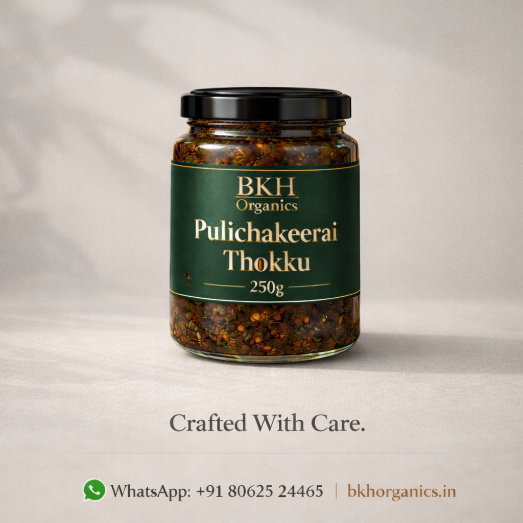 Jar of BKH Organics Pulichakeerai Thokku on a light gray background