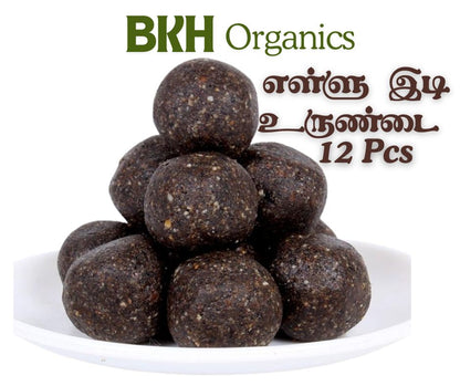 Bowl of dark brown energy balls with 'BKH Organics' branding on a white background. Ellu idi Urundai 12Pcs
