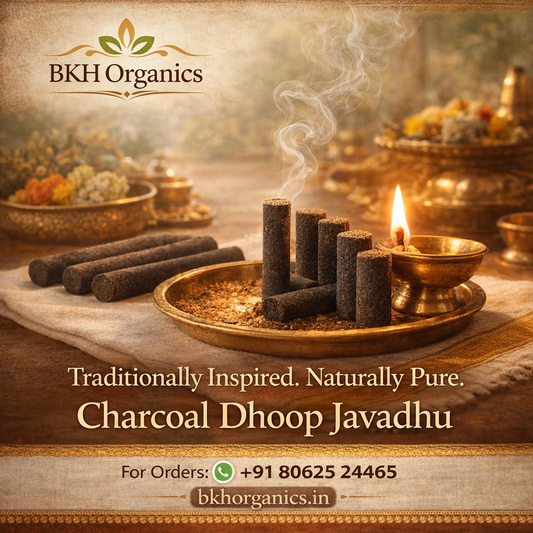 BKH Organics Charcoal Dhoop Javadhu with incense sticks and a lit candle on a wooden surface. 