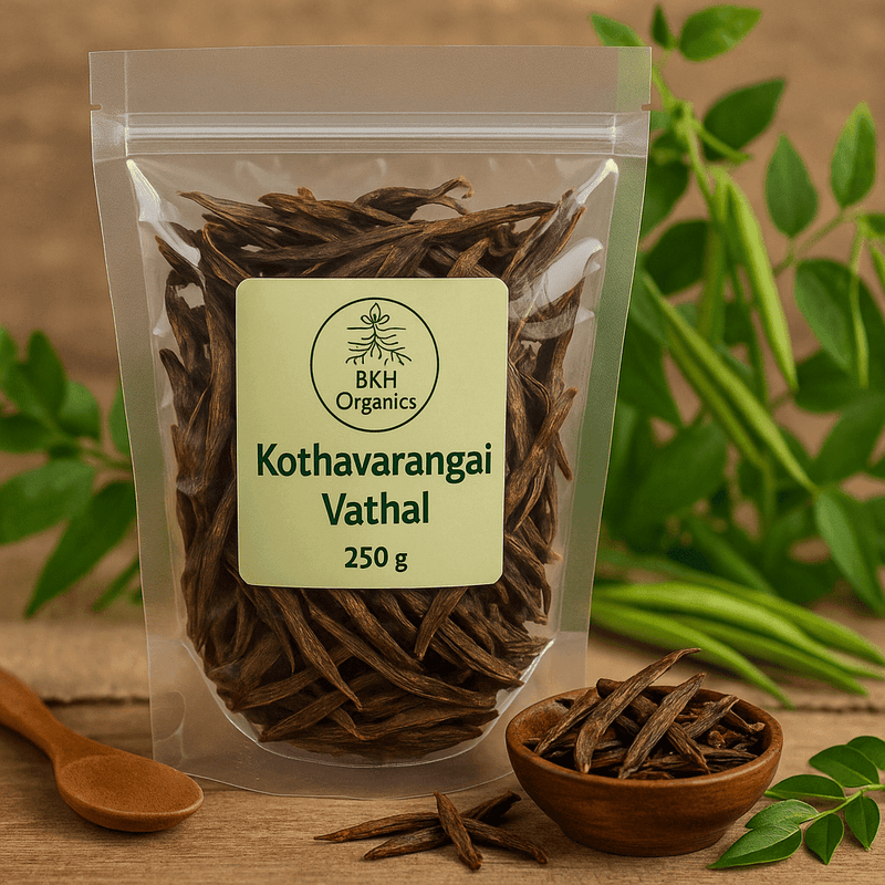 Packaged Kothavarangai Vathal with BKH Organics label on a wooden surface with green leaves in the background
