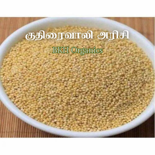 White bowl filled with mustard seeds on a wooden surface, with 'BKH Organics' branding.