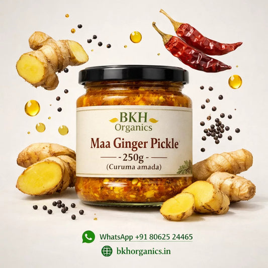 Jar of BKH Organics Maa Ginger Pickle with ginger roots and chilies on a light background