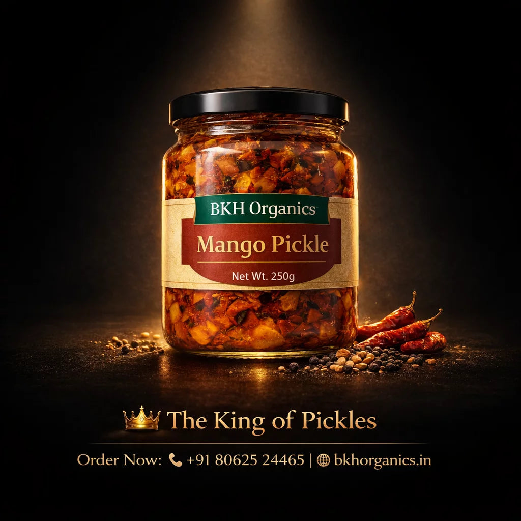 Jar of BKH Organics Mango Pickle with chilies on a dark background