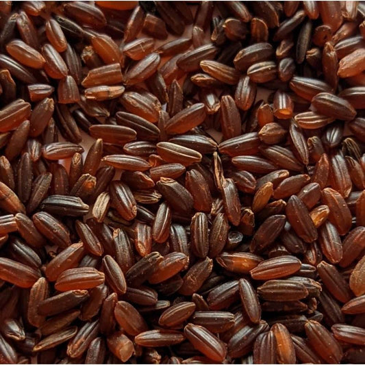 Close-up of a pile of brown rice grains Mappillai Samba Rice 1kg - BKH Organics