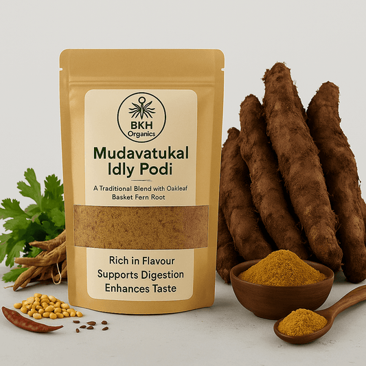 BKH Organics Mudavatukal Idly Podi packaging with ingredients on a light gray background - Close-up of Oakleaf Basket Fern Root, - Mudavatukal Kizhangu