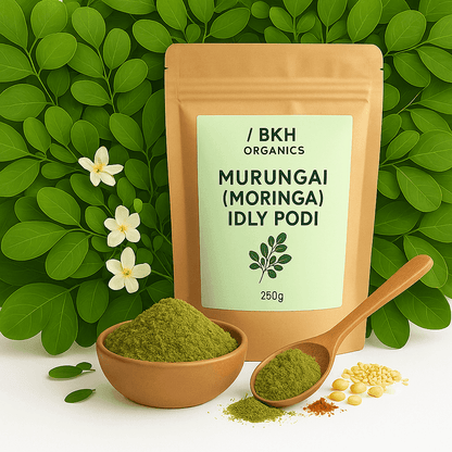 BKH Organics Murungai Moringa Idly Podi packaging with green leaves and flowers in the background. Murungai idly & Dosa Podi 250g - BKH Organics