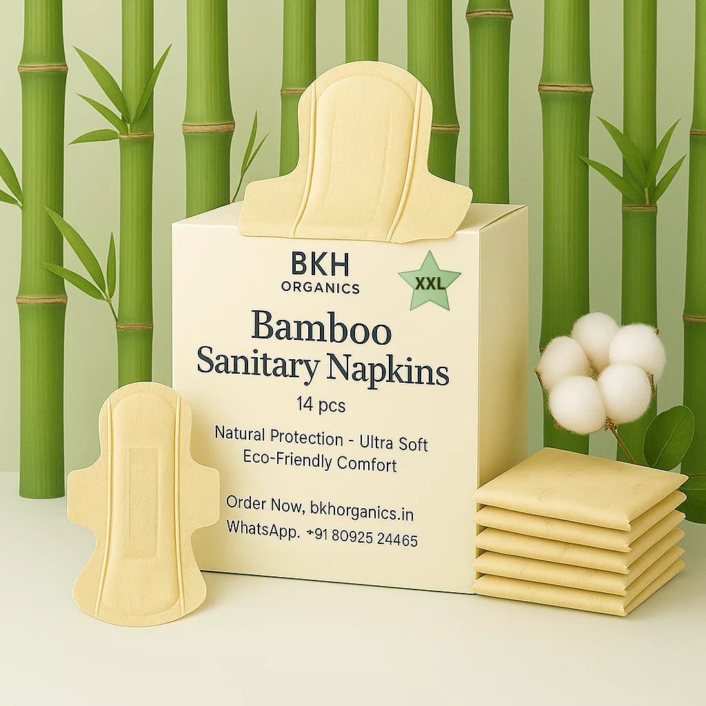 BKH Organics Bamboo Sanitary Napkins XXL packaging with bamboo stalks and cotton flowers in the background