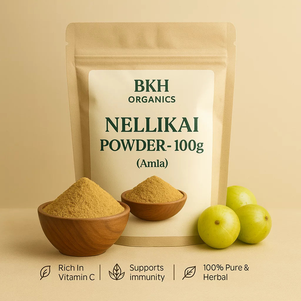 BKH Organics Nellikai Powder packaging with two wooden bowls of powder and three green fruits on a beige background.