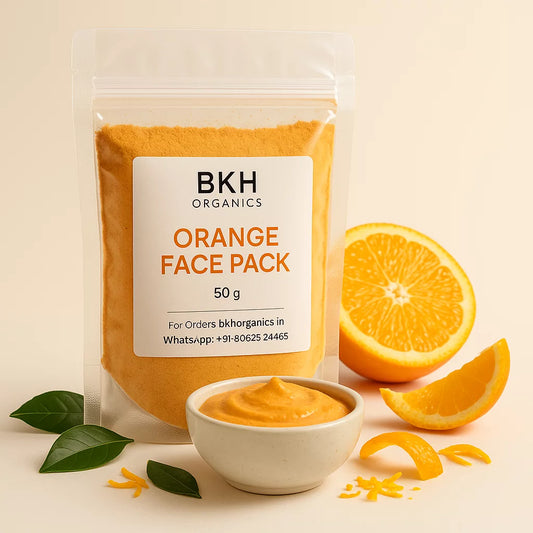 BKH Organics Orange Face Pack with oranges and a bowl of face pack on a beige background