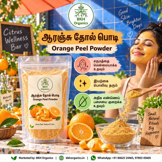 A promotional product image for BKH Organics Orange Peel Powder. A large stand-up pouch of the powder is shown on a table alongside bowls of the powder, fresh orange slices, and oranges. BKH Organics Pure Natural Orange Peel Powder (தமிழ்: ஆரஞ்சு தோல் பொடி, తెలుగు: కమలాఫలం తొక్క పొడి, ಕನ್ನಡ: ಕಿತ್ತಳೆ ಸಿಪ್ಪೆ ಪುಡಿ, മലയാളം: ഓറഞ്ച് തൊലി പൊടി, ತುಳು: ಕಿತ್ತಲೆ ಚೋಲಿ ಪೊಡಿ) jar for skincare and glowing face packs