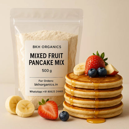 BKH Organics mixed fruit pancake mix package with a stack of pancakes and fresh fruits on a beige background