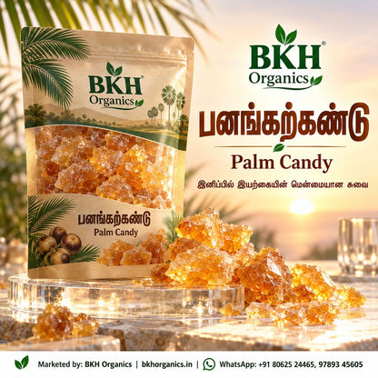 BKH Organics Natural Palm Candy / Panang Karkandu (தமிழ்: பனங்கற்கண்டு, తెలుగు: తాటి కలకండ, ಕನ್ನಡ: ತಾಳೆ ಕಲ್ಲುಸಕ್ಕರೆ / ತಾಳೆ ಬೆಲ್ಲದ ಕಲ್ಲು, മലയാളം: പനംകൽക്കണ്ടം, ತುಳು: ತಾರೆದ ಕಲ್ಲ್ ಸಕ್ಕರೆ) pouch with golden crystalline chunks on a glass platform under palm trees