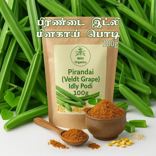 BKH Organics Pirandai Idly Podi packaging with green vegetables in the background
