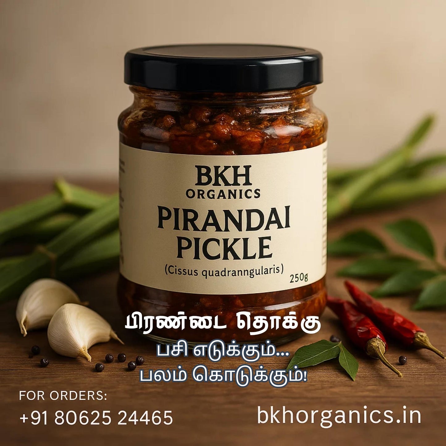 Jar of BKH Organics Pirandai Pickle with ingredients on a wooden surface