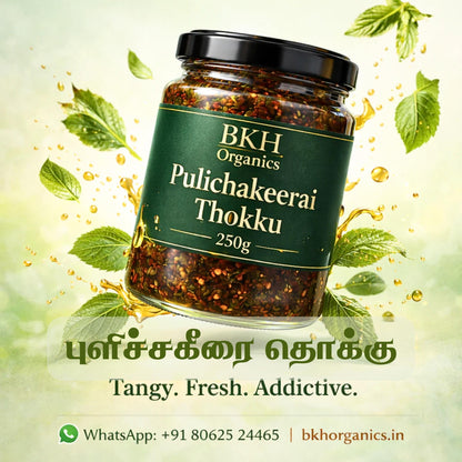 BKH Organics Pulichakeerai Thokku jar with green leaves on a light background