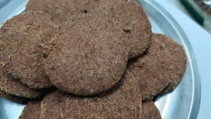 Stack of brown cookies on a white plate, Ragi Millet Biscuits - BKH Organics