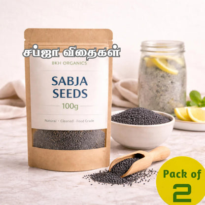 Pack of BKH Organics Sabja Seeds with a bowl of seeds and lemon slices in the background.