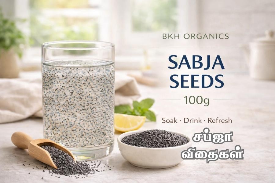 Glass of water with sabja seeds, bowl of seeds, and wooden scoop on a light surface with 'BKH Organics' branding.