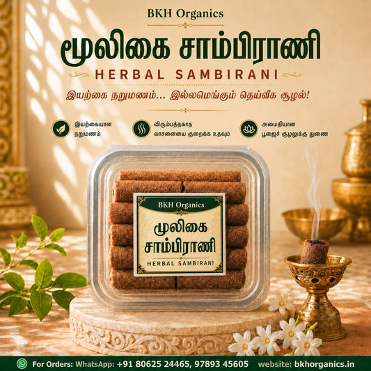 A packaged tray of BKH Organics Herbal Sambirani cookies displayed on a carved pedestal with decorative props including a burning incense holder, flowers, and brass vessels in a warm, rustic setting.
