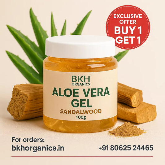 BKH Organics Aloe Vera Gel Sandalwood jar with aloe vera leaves and sandalwood pieces on a beige background.