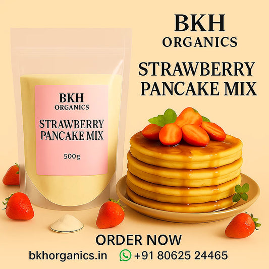 BKH Organics Strawberry Pancake Mix packaging with a stack of pancakes and strawberries on a beige background.