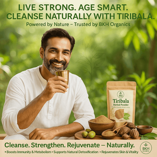Man drinking from a cup with Tiribala herbal powder packaging and ingredients on a table outdoors.
