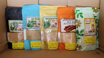 Five colorful packages of Idly Dosa Flour on a cardboard surface.  Idly Podi Combo-1  - BKH Organics