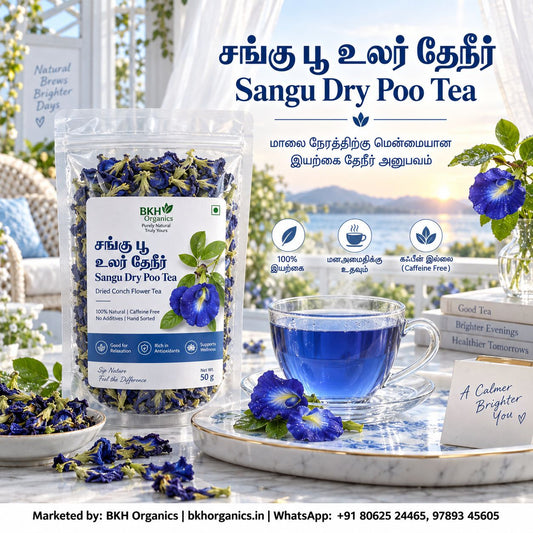 BKH Organics Dried Butterfly Pea Flower Tea / Sangu Poo (தமிழ்: சங்கு பூ உலர் தேநீர், తెలుగు: శంఖు పుష్పం టీ, ಕನ್ನಡ: ಶಂಖ ಪುಷ್ಪ ಚಹಾ, മലയാളം: ശംഖുപുഷ്പം ചായ, ತುಳು: ಶಂಖ ಪುಷ್ಪ ಚಾ) pouch with a glass cup of blue herbal tea and fresh blossoms